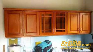 wood finished pantry cupboards